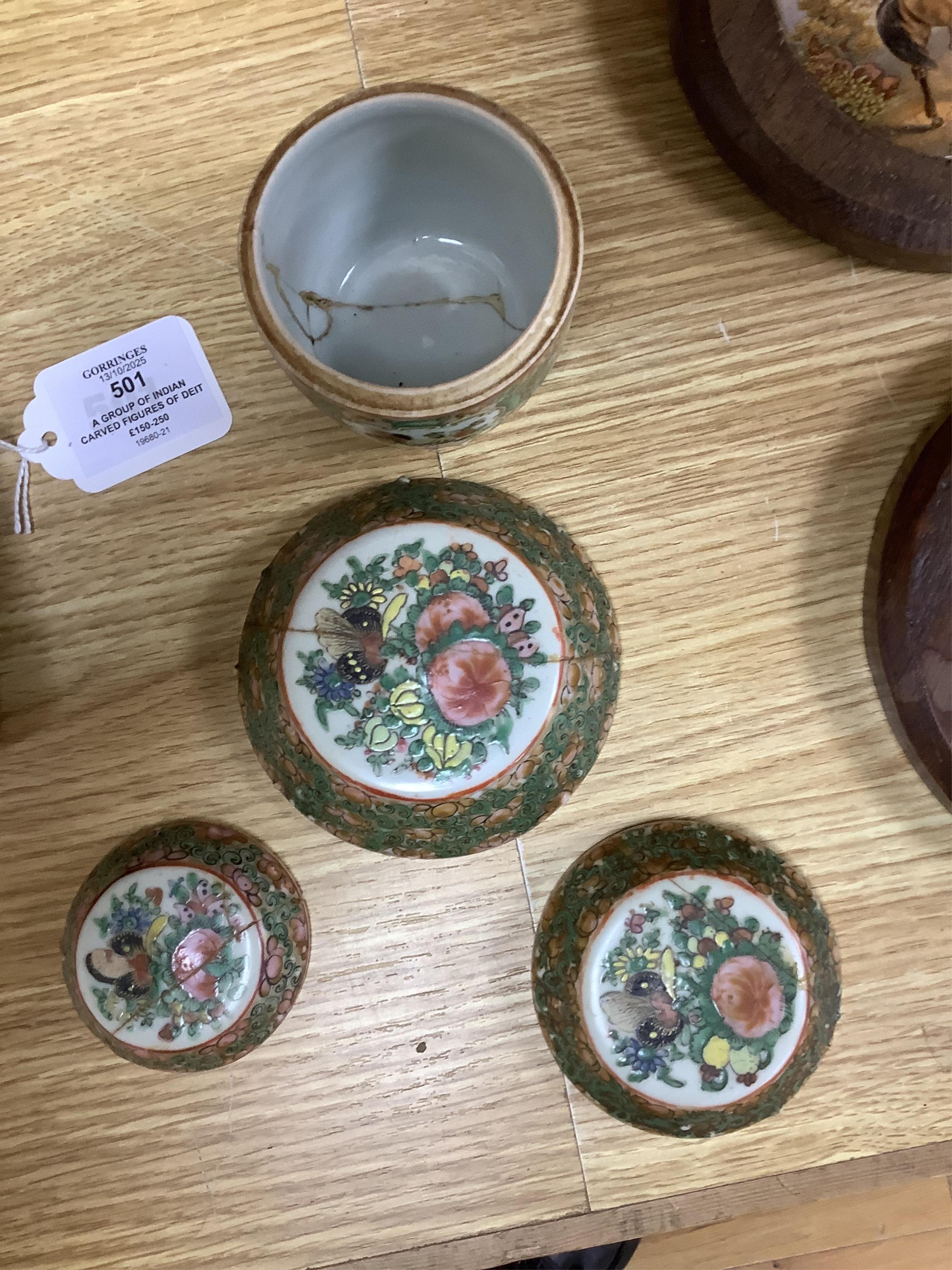 A collection of Chinese ceramics to include a blue and white mug, set of three graduated Canton jars and covers and two cylindrical brush washers